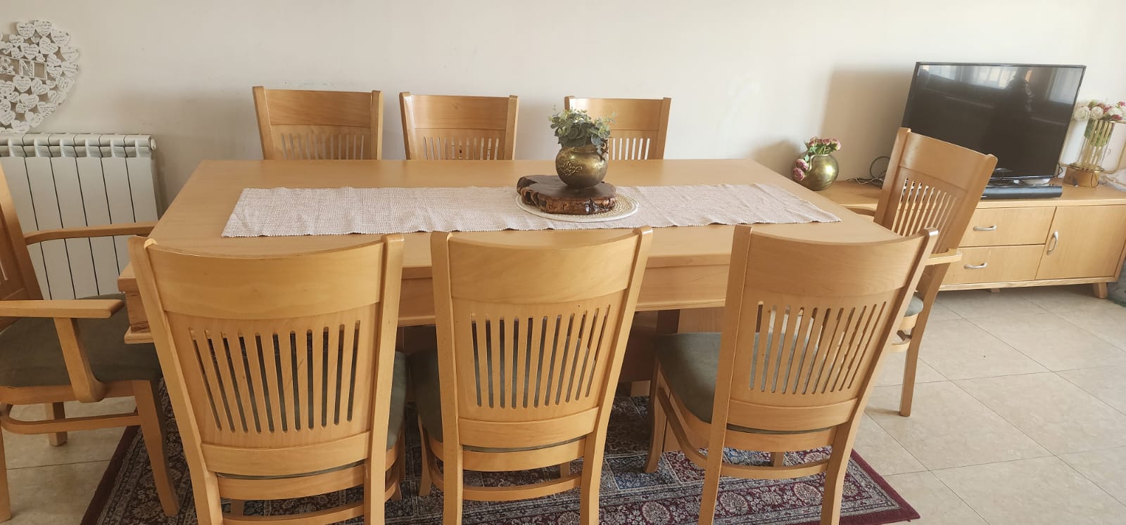 Wooden dining table with chairs