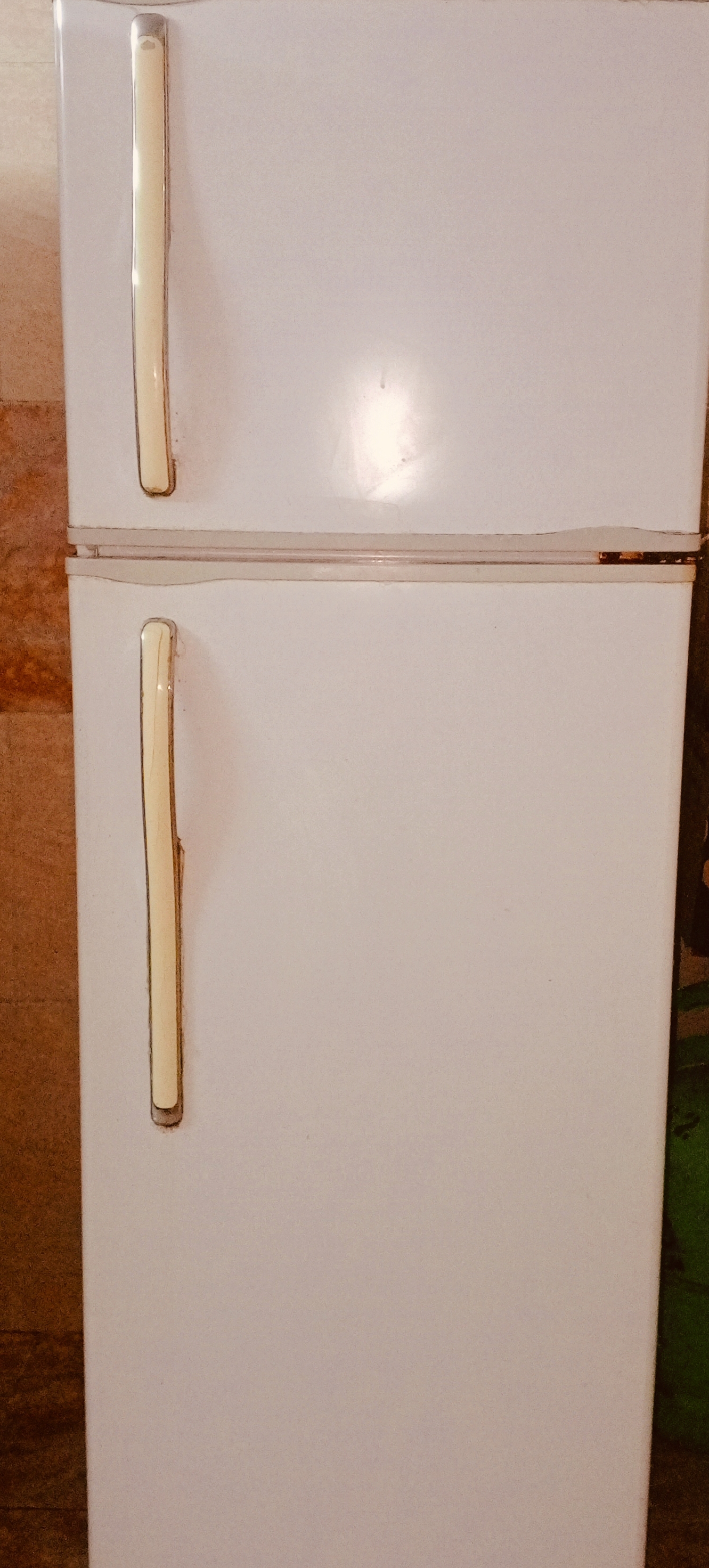 White two-door refrigerator