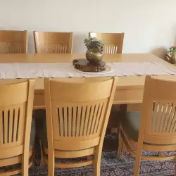 Wooden dining table with chairs